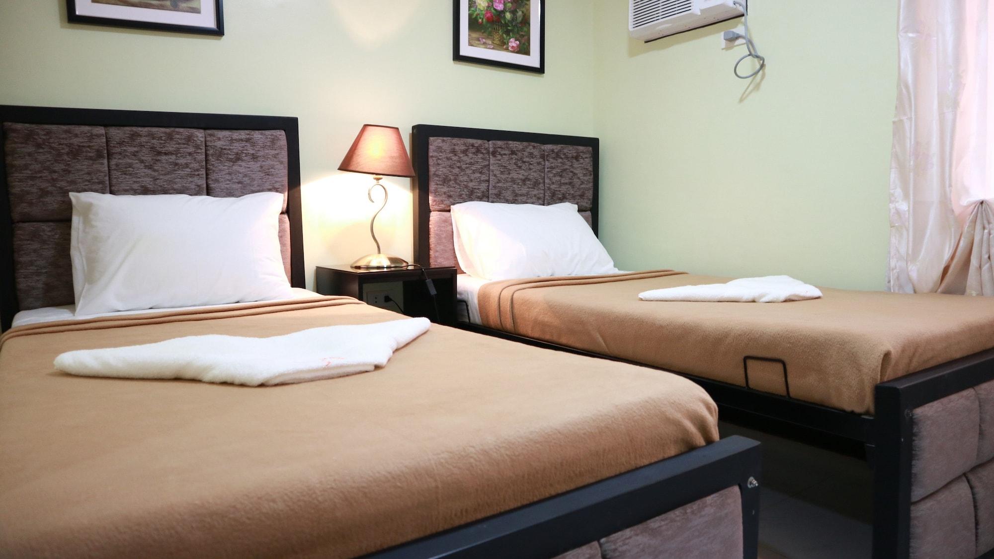 Doniti Suites And Events Place 曼达卢永 外观 照片