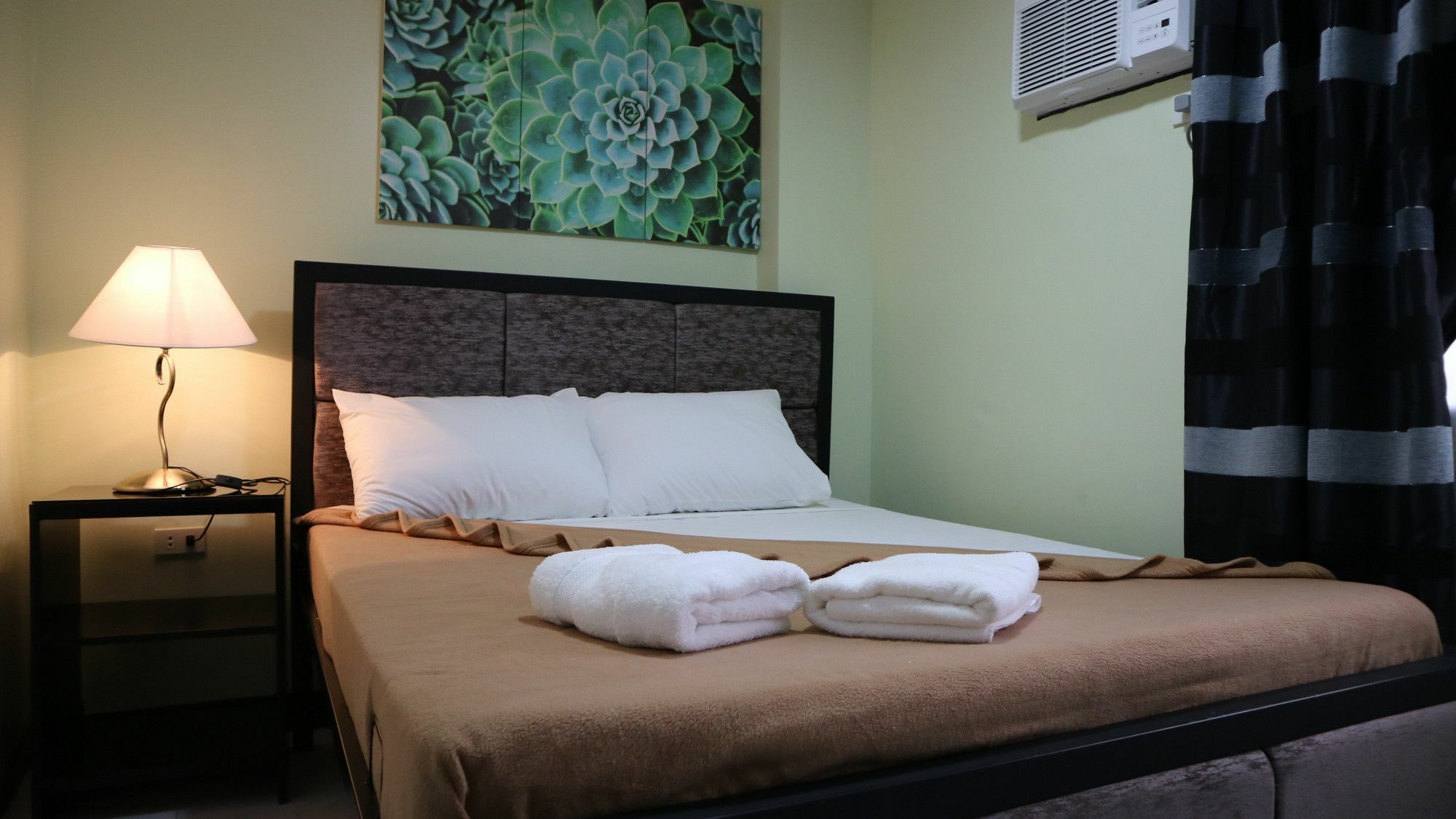 Doniti Suites And Events Place 曼达卢永 外观 照片